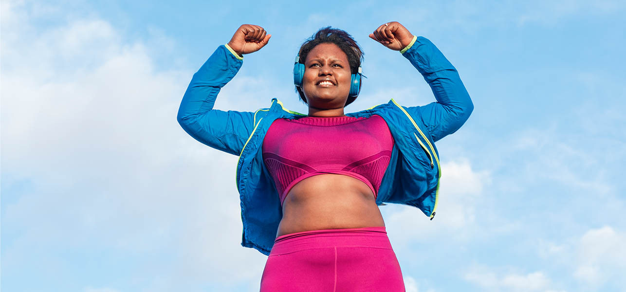 woman with headphones working out
