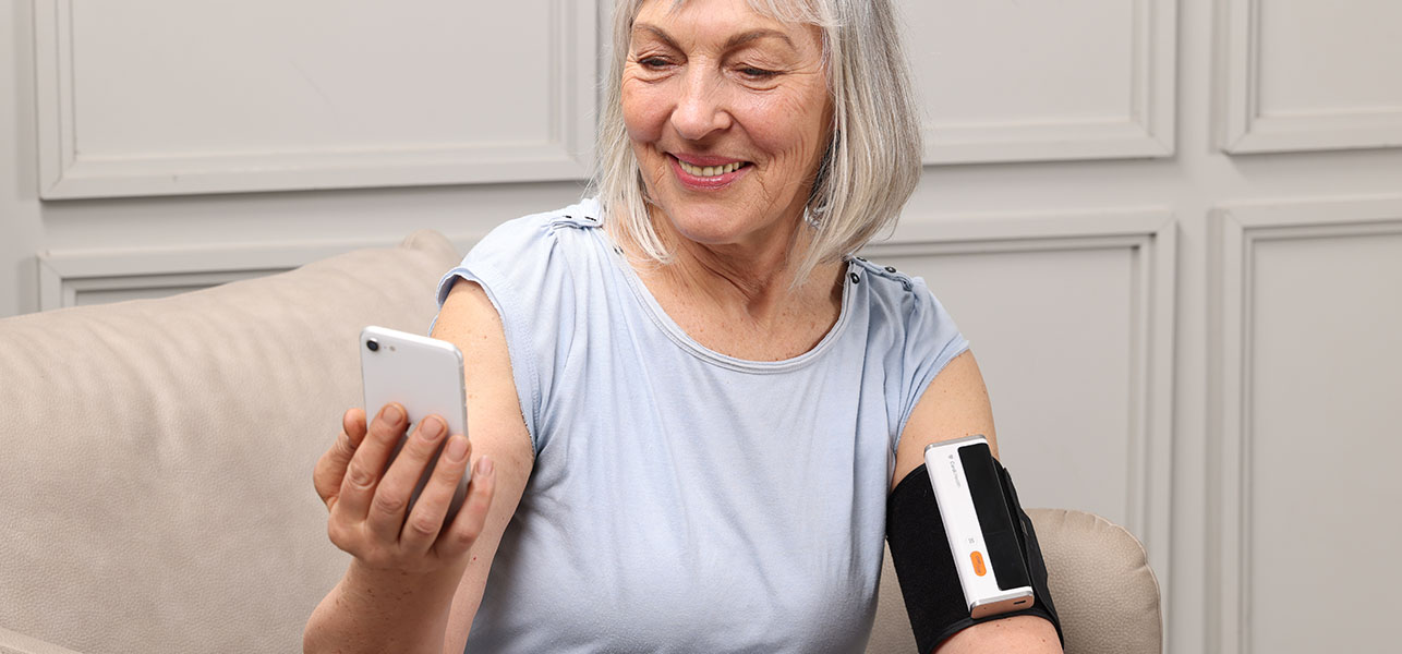 Older woman looking at her phone