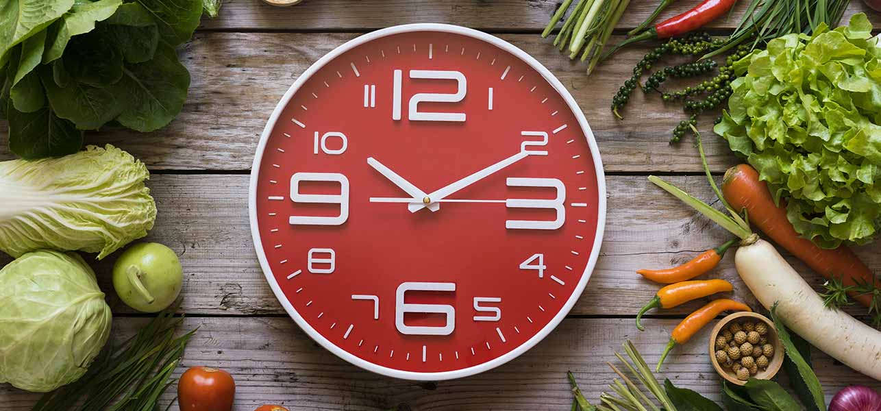 food and clock on the table